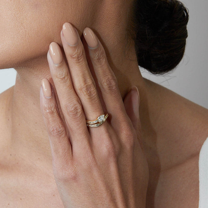 Pear & Baguette Diamond Curved Band