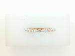 14K ROSE GOLD "LIBERTY" ETERNITY BAND FEATURING 0.49TCW MARQUISE DIAMONDS AND 0.32TCW ROUND BRILLIANT DIAMONDS (G/H COLOR, SI CLARITY) BY G.ST CEREMONY.