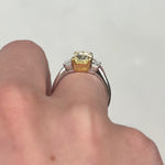 Three Stone Engagement Ring with a Fancy Yellow Diamond