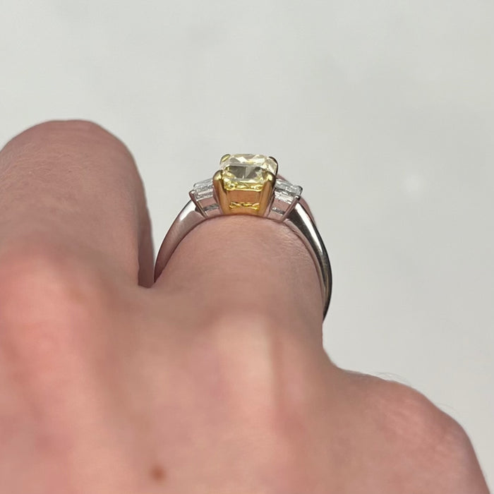 Three Stone Engagement Ring with a Fancy Yellow Diamond