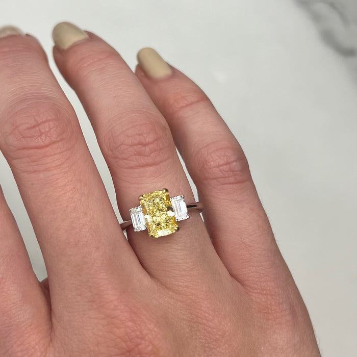 Three Stone Engagement Ring with a Fancy Yellow Diamond