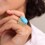18K Yellow Gold Cocktail Ring with a Sleeping Beauty Pear Shape Turquoise and 2.00tcw Round Brilliant Cut Diamonds