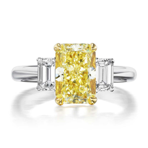 Three Stone Engagement Ring with a Fancy Yellow Diamond