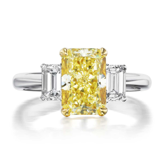 Three Stone Engagement Ring with a Fancy Yellow Diamond