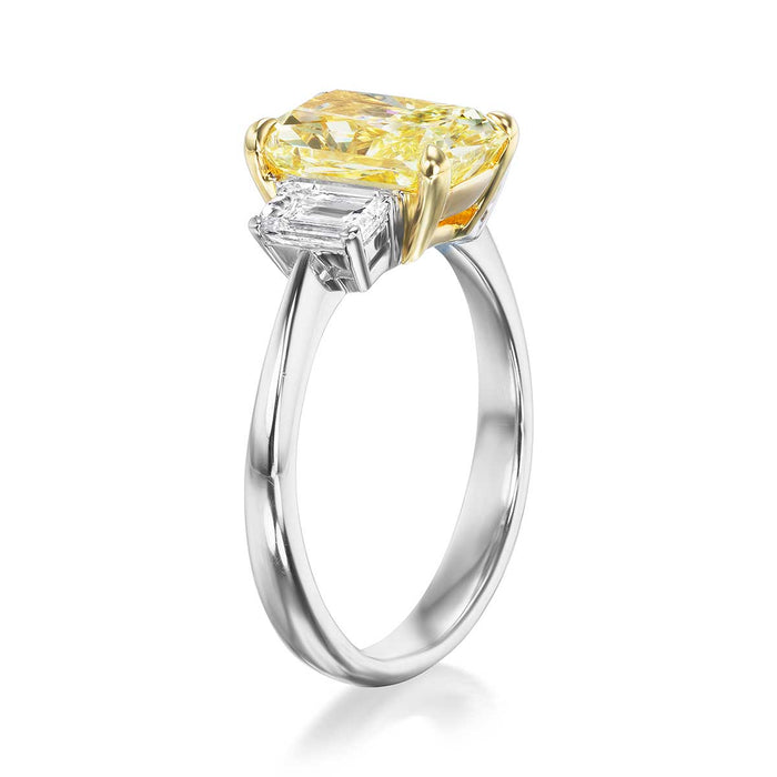 Three Stone Engagement Ring with a Fancy Yellow Diamond