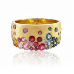 14K YELLOW GOLD CIGAR BAND WITH SATIN FINISH FEATURING 1.36TCW RAINBOW SAPPHIRES & TSAVORITES FLUSH SET, FROM STARDUST BY G.ST.

SIZE 6.75