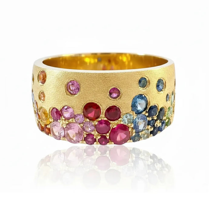 14K YELLOW GOLD CIGAR BAND WITH SATIN FINISH FEATURING 1.36TCW RAINBOW SAPPHIRES & TSAVORITES FLUSH SET, FROM STARDUST BY G.ST.

SIZE 6.75