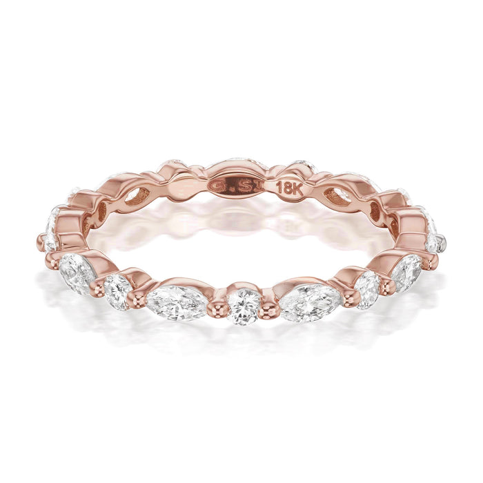 14K ROSE GOLD "LIBERTY" ETERNITY BAND FEATURING 0.49TCW MARQUISE DIAMONDS AND 0.32TCW ROUND BRILLIANT DIAMONDS (G/H COLOR, SI CLARITY) BY G.ST CEREMONY.