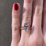 14K ROSE GOLD "LIBERTY" ETERNITY BAND FEATURING 0.49TCW MARQUISE DIAMONDS AND 0.32TCW ROUND BRILLIANT DIAMONDS (G/H COLOR, SI CLARITY) BY G.ST CEREMONY.