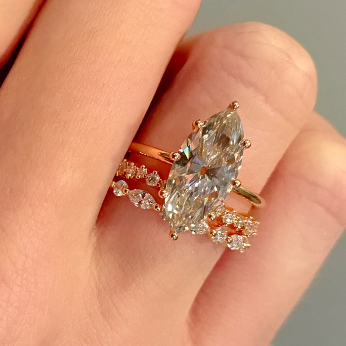 14K ROSE GOLD "LIBERTY" ETERNITY BAND FEATURING 0.49TCW MARQUISE DIAMONDS AND 0.32TCW ROUND BRILLIANT DIAMONDS (G/H COLOR, SI CLARITY) BY G.ST CEREMONY.