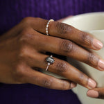 14K ROSE GOLD "LIBERTY" ETERNITY BAND FEATURING 0.49TCW MARQUISE DIAMONDS AND 0.32TCW ROUND BRILLIANT DIAMONDS (G/H COLOR, SI CLARITY) BY G.ST CEREMONY.