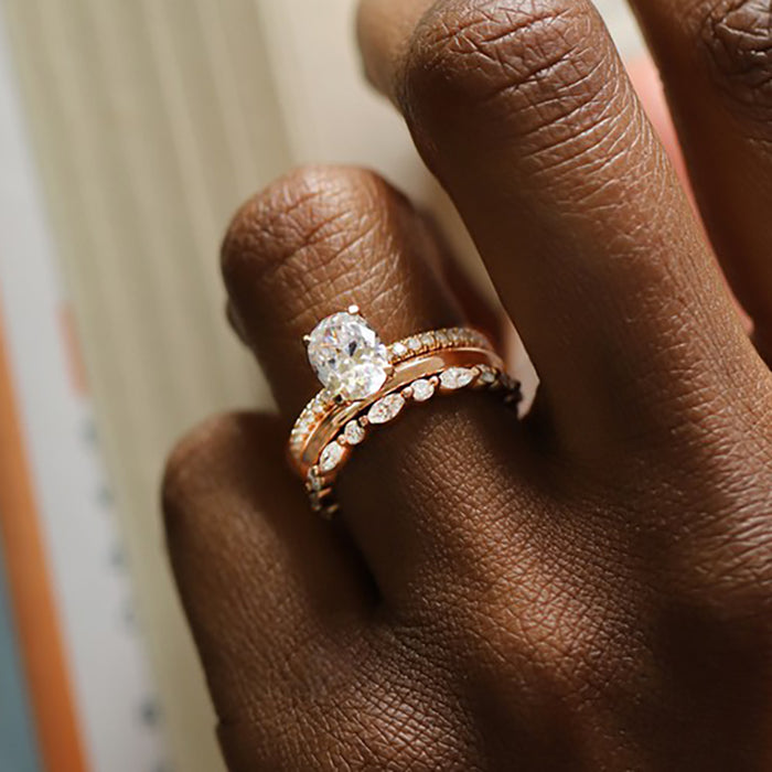 14K ROSE GOLD "LIBERTY" ETERNITY BAND FEATURING 0.49TCW MARQUISE DIAMONDS AND 0.32TCW ROUND BRILLIANT DIAMONDS (G/H COLOR, SI CLARITY) BY G.ST CEREMONY.