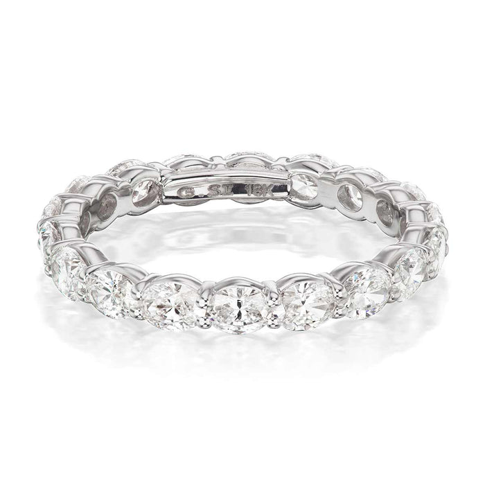 PLATINUM VARICK ETERNITY BAND WITH 1.71TCW HORIZONTAL SET OVAL BRILLIANT DIAMONDS BY G.ST CEREMONY.
