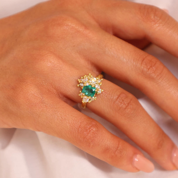 Emerald Sweeping Cluster Ring