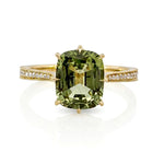 18K YELLOW GOLD "VICTORIA" 8-PRONG SOLITAIRE ENGAGEMENT RING WITH 0.10TCW ROUND BRILLIANT CUT (F-G COLOR, VS CLARITY) HALF DIAMOND SHANK FEATURING A 2.06CT MINT GREEN CUSHION CUT MONTANA SAPPHIRE FROM ERIKA WINTERS.