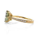 18K YELLOW GOLD "VICTORIA" 8-PRONG SOLITAIRE ENGAGEMENT RING WITH 0.10TCW ROUND BRILLIANT CUT (F-G COLOR, VS CLARITY) HALF DIAMOND SHANK FEATURING A 2.06CT MINT GREEN CUSHION CUT MONTANA SAPPHIRE FROM ERIKA WINTERS.