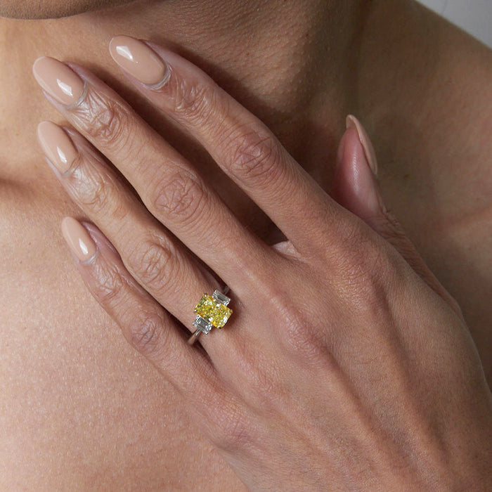 Three Stone Engagement Ring with a Fancy Yellow Diamond